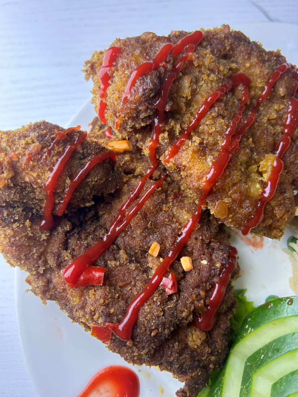 Crispy breaded fillets with a chilli glaze